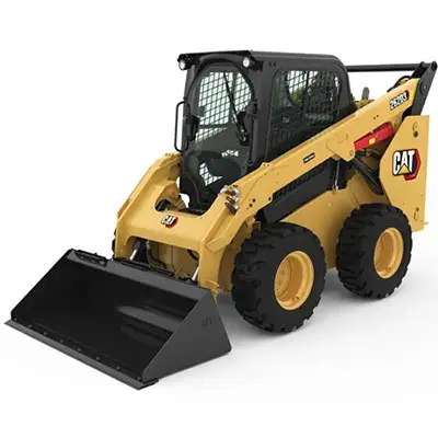 Skid steer loader working on a confined construction site