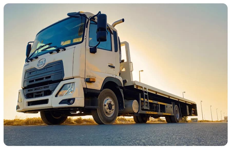 Low bed trailer transporting heavy equipment in the UAE